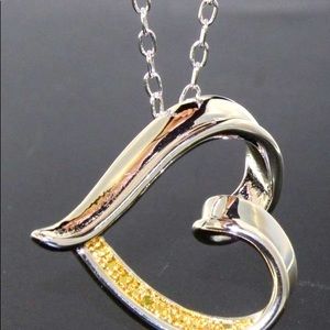 Yellow Diamond accented pendant